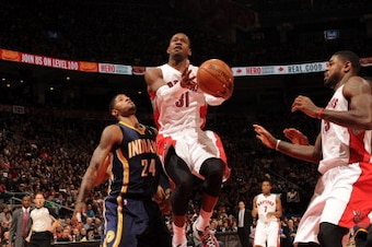 TORONTO, CANADA - January 1: Terrence Ross #31 of the Toronto Raptors goes to the basket against the Indiana Pacers on January 1, 2014 at the Air Canada Centre in Toronto, Ontario, Canada.  NOTE TO USER: User expressly acknowledges and agrees that, by dow