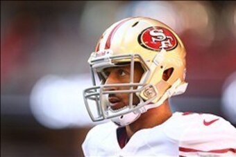 Dec 29, 2013; Phoenix, AZ, USA; San Francisco 49ers quarterback Colin Kaepernick warms up prior to the game against the Arizons Cardinals at University of Phoenix Stadium. Mandatory Credit: Mark J. Rebilas-USA TODAY Sports