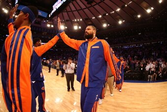 NEW YORK, NY - DECEMBER 21:  Tyson Chandler #6 of the New York Knicks runs out before the game against the Memphis Grizzlies during a game at Madison Square Garden in New York City on December 21, 2013.  NOTE TO USER: User expressly acknowledges and agree