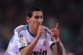 MADRID, SPAIN - APRIL 27:  Angel di Maria of Real Madrid celebrates after scoring Real's 2nd goal during the La Liga match between Atletico de Madrid and Real Madrid at estadio Vincente Calderon on April 27, 2013 in Madrid, Spain.  (Photo by Denis Doyle/G