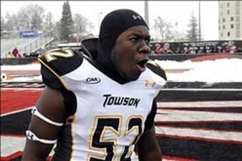 Dec 21, 2013; Cheney, WA, USA; Towson Tigers linebacker Malik Jackson (52) celebrates after after a game against the Eastern Washington Eagles at Roos Field. The Tiger beat Eagles 35-31. Mandatory Credit: James Snook-USA TODAY Sports