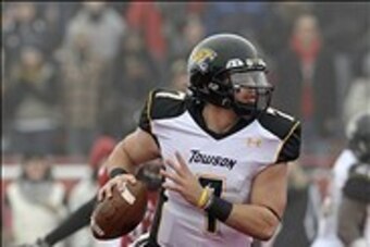 Dec 21, 2013; Cheney, WA, USA; Towson Tigers quarterback Peter Athens (7) rolls out for a pass against the Eastern Washington Eagles during the first half at Roos Field. Mandatory Credit: James Snook-USA TODAY Sports