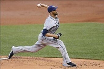 Oct 5, 2013; Boston, MA, USA; Tampa Bay Rays pitcher David Price (14) delivers a pitch during the first inning in game two of the American League divisional series playoff baseball game against the Boston Red Sox at Fenway Park. Mandatory Credit: Greg M. 