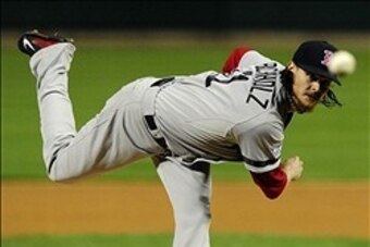 Oct 27, 2013; St. Louis, MO, USA; Boston Red Sox starting pitcher Clay Buchholz (11) throws against the St. Louis Cardinals during the first inning of game four of the MLB baseball World Series at Busch Stadium. Mandatory Credit: Jeff Curry-USA TODAY Spor