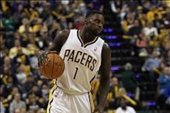 Dec 31, 2013; Indianapolis, IN, USA;  Indiana Pacers shooting guard Lance Stephenson (1) dribbles the ball during the third quarter against the Cleveland Cavaliers at Bankers Life Fieldhouse. The Pacers won 91-76.  Mandatory Credit: Pat Lovell-USA TODAY S