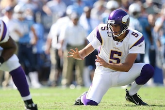 NASHVILLE, TN - SEPTEMBER 28:  Holder Chris Kluwe #5 of the Minnesota Vikings takes the snap during a field goal attempt while taking on the Tennessee Titans at LP Field on September 28, 2008 in Nashville, Tennessee. The Titans defeated the Vikings 30-17.