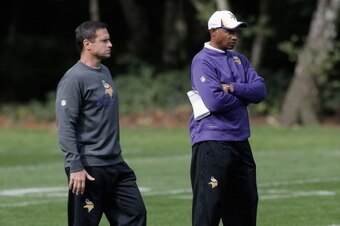 LONDON, ENGLAND - SEPTEMBER 26:  Special Teams Coordinator Mike Priefer (L) and Head Coach Leslie Frazier look on during a Minnesota Vikings training session at the Grove Hotel on September 26, 2013 in London, England.  (Photo by Harry Engels/Getty Images