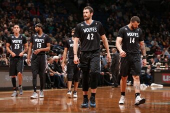 MINNEAPOLIS, MN - NOVEMBER 27:  Kevin Love #42 of the Minnesota Timberwolves and his team walk on the court against the Denver Nuggets on November 27, 2013 at Target Center in Minneapolis, Minnesota. NOTE TO USER: User expressly acknowledges and agrees th