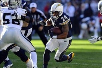 Dec 22, 2013; San Diego, CA, USA; San Diego Chargers running back Ryan Mathews (24) runs for a short gain during the first half against the Oakland Raiders at Qualcomm Stadium. Mandatory Credit: Christopher Hanewinckel-USA TODAY Sports