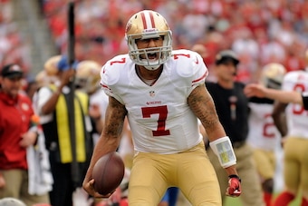 TAMPA, FL - DECEMBER 15: Colin Kaepernick #7 of the San Francisco 49ers reacts to a first down against the Tampa Bay Buccaneers during a game at Raymond James Stadium on December 15, 2013 in Tampa, Florida. San Francisco won the game 33-14. (Photo by S TAMPA, FL - DECEMBER 15: Colin Kaepernick #7 of the San Francisco 49ers reacts to a first down against the Tampa Bay Buccaneers during a game at Raymond James Stadium on December 15, 2013 in Tampa, Florida. San Francisco won the game 33-14. (Photo by S