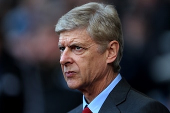 LONDON, ENGLAND - DECEMBER 26:  Arsene Wenger manager of Arsenal looks on prior to the Barclays Premier League match between West Ham United and Arsenal at Boleyn Ground on December 26, 2013 in London, England.  (Photo by Ian Walton/Getty Images)