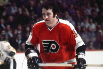 BOSTON, MA. - 1970's: Joe Watson of the Philadelphia Flyers plays against the Boston Bruins .  (Photo by Steve Babineau/NHLI via Getty Images)