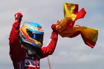 MONTMELO, SPAIN - MAY 12:  Fernando Alonso of Spain and Ferrari celebrates in parc ferme after winning the Spanish Formula One Grand Prix at the Circuit de Catalunya on May 12, 2013 in Montmelo, Spain.  (Photo by Clive Rose/Getty Images)