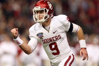 NEW ORLEANS, LA - JANUARY 02:  Trevor Knight #9 of the Oklahoma Sooners celebrates a touchdown against the Alabama Crimson Tide during the Allstate Sugar Bowl at the Mercedes-Benz Superdome on January 2, 2014 in New Orleans, Louisiana.  (Photo by Sean Gar