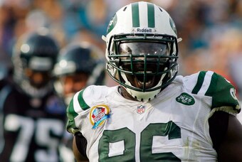 Dec 9, 2012; Jacksonville FL, USA; New York Jets defensive end Muhammad Wilkerson (96) celebrates sacking Jacksonville Jaguars quarterback Chad Henne (not pictured) in the third quarter of their game at EverBank Field. The New York Jets beat the Jacksonvi