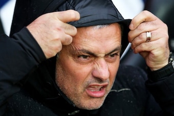 SOUTHAMPTON, ENGLAND - JANUARY 01:  Jose Mourinho the Chelsea manager braves the elements  during the Barclays Premier League match between Southampton and Chelsea at St Mary's Stadium on January 1, 2014 in Southampton, England.  (Photo by Warren Little/G