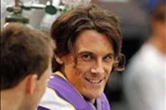 Sep 23, 2012; Minneapolis, MN, USA; Minnesota Vikings punter Chris Kluwe (5)  talks on the sidelines in the fourth quarter of the game against the San Francisco 49ers at the Metrodome. Vikings win 24-13. Mandatory Credit: Bruce Kluckhohn-USA TODAY Sports