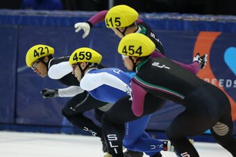SALT LAKE CITY, UT - AUGUST 25: Keith Carol (2nd R) and Cole Krueger (R) collide as C.J. Celski (L) Jordan Malone (L-2nd) skates in the men's 1000m first race finals at the Short Track US Single Distance Championships on August 25, 2013 at the Olympic Ova