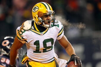 Dec 29, 2013; Chicago, IL, USA; Green Bay Packers wide receiver Randall Cobb (18) reacts to scoring the winning touchdown during the second half against the Chicago Bears at Soldier Field. Green Bay won 33-28. Mandatory Credit: Dennis Wierzbicki-USA TODAY
