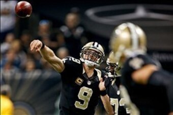 Dec 29, 2013; New Orleans, LA, USA; New Orleans Saints quarterback Drew Brees (9) throws against the Tampa Bay Buccaneers during the first quarter of a game at the Mercedes-Benz Superdome. Mandatory Credit: Derick E. Hingle-USA TODAY Sports