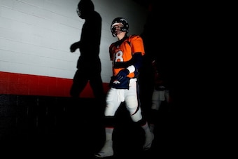 DENVER, CO - DECEMBER 12:   Peyton Manning #18 of the Denver Broncos prepares for their game against the San Diego Chargers at Sports Authority Field at Mile High on December 12, 2013 in Denver, Colorado.  (Photo by Justin Edmonds/Getty Images)