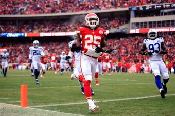 KANSAS CITY, MO - DECEMBER 22:  Running back Jamaal Charles #25 of the Kansas City Chiefs carries the ball across the goal line for a touchdwon during the game against the Indianapolis Colts at Arrowhead Stadium on December 22, 2013 in Kansas City, Missou
