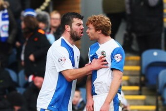 BLACKBURN, ENGLAND - JANUARY 04:  Team mates Grant Hanley (L) and Chris Taylor of Blackburn Rovers argue as the sides go off at half time during the Budweiser FA Cup third round match between Blackburn Rovers and Manchester City at Ewood Park on January 4
