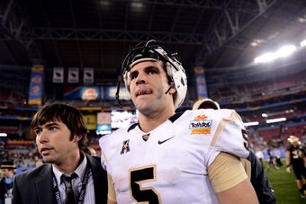 GLENDALE, AZ - JANUARY 01: Quarterback Blake Bortles #5 of the UCF Knights walks off the field after defeating the Baylor Bears 52-42 in the Tostitos Fiesta Bowl at University of Phoenix Stadium on January 1, 2014 in Glendale, Arizona.  (Photo by Jennifer