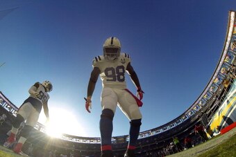 SAN DIEGO, CA - OCTOBER 14:  Robert Mathis #98 of the Indianapolis Colts looks on during warm-ups against the San Diego Chargers on October 14, 2013 at Qualcomm Stadium in San Diego, California. (Photo by Donald Miralle/Getty Images)