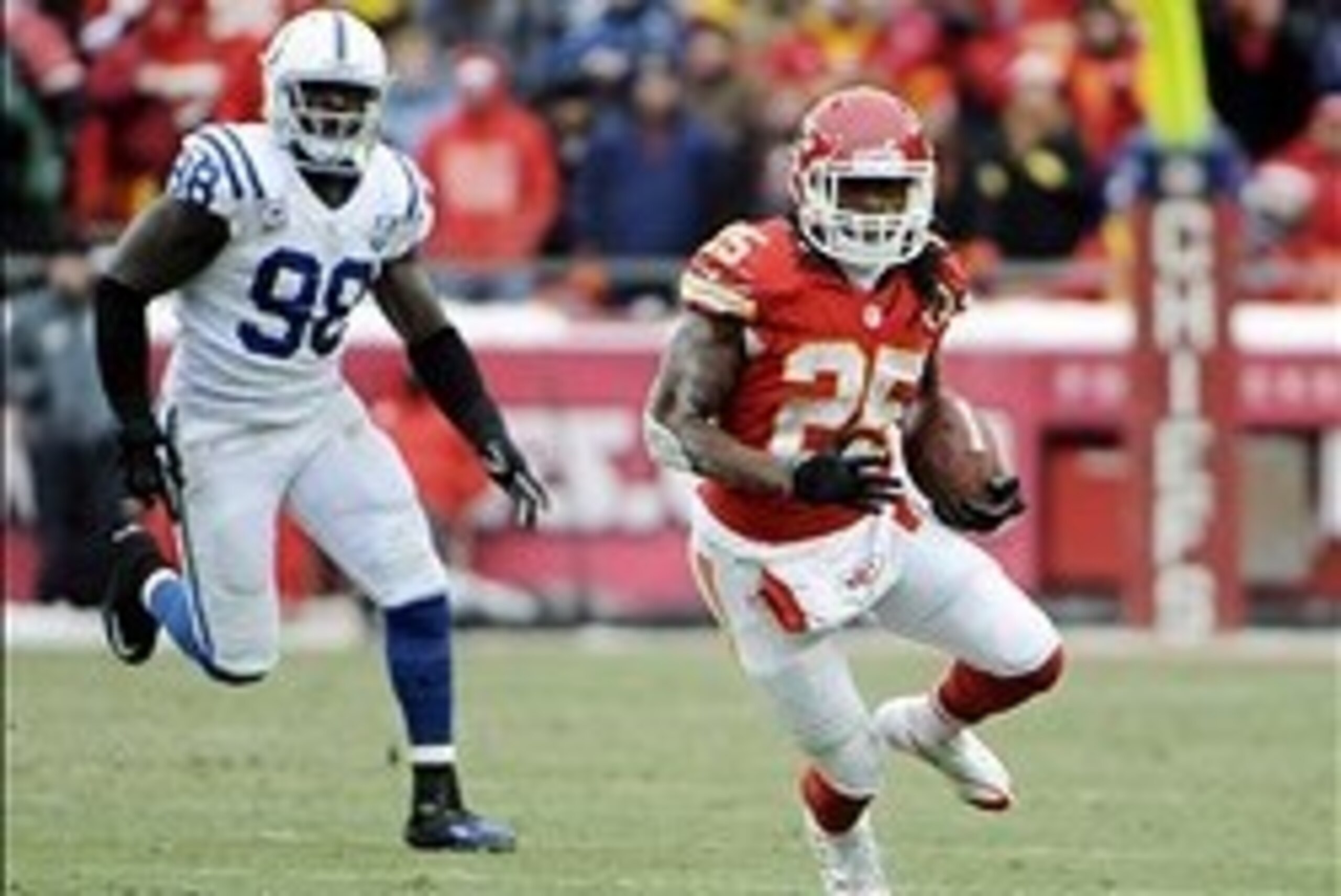 Dec 22, 2013; Kansas City, MO, USA; Kansas City Chiefs running back Jamaal Charles (25) carries the ball against the Indianapolis Colts in the first half at Arrowhead Stadium. Mandatory Credit: John Rieger-USA TODAY Sports