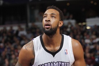 SACRAMENTO, CA - DECEMBER 23: Derrick Williams #13 of the Sacramento Kings attempts a free throw shot against the New Orleans Pelicans on December 23, 2013 at Sleep Train Arena in Sacramento, California. NOTE TO USER: User expressly acknowledges and agree