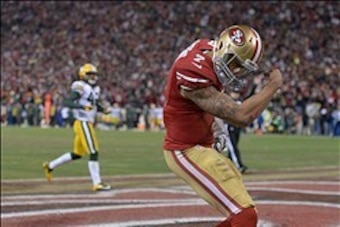 Jan 12, 2013; San Francisco, CA, USA; San Francisco 49ers quarterback Colin Kaepernick (7) celebrates after scoring on a 56-yard touchdown run against the Green Bay Packers in the NFC divisional round playoff game at Candlestick Park. Mandatory Credit: K Jan 12, 2013; San Francisco, CA, USA; San Francisco 49ers quarterback Colin Kaepernick (7) celebrates after scoring on a 56-yard touchdown run against the Green Bay Packers in the NFC divisional round playoff game at Candlestick Park. Mandatory Credit: K