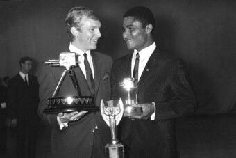Eusebio with his BBC Overseas Personality Award in 1966, alongside Sports Personality and World Cup winner Bobby Moore