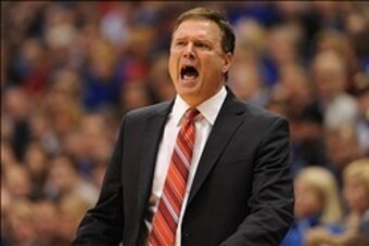 Jan 5, 2014; Lawrence, KS, USA; Kansas Jayhawks head coach Bill Self reacts to play during the first half of the game against the San Diego State Aztecs at Allen Fieldhouse. Mandatory Credit: Denny Medley-USA TODAY Sports