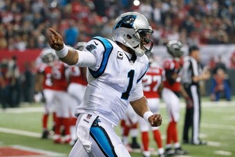 ATLANTA, GA - DECEMBER 29:  Cam Newton #1 of the Carolina Panthers celebrates a touchdown against the Atlanta Falcons at Georgia Dome on December 29, 2013 in Atlanta, Georgia.  (Photo by Kevin C. Cox/Getty Images)