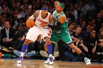 NEW YORK, NY - APRIL 23: Carmelo Anthony #7 of the New York Knicks dribbles against Paul Pierce #34 of the Boston Celtics  during Game two of the Eastern Conference Quarterfinals of the 2013 NBA Playoffs at Madison Square Garden on April 23, 2013 in New Y