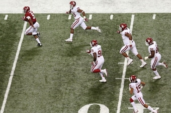 NEW ORLEANS, LA - JANUARY 02: Amari Cooper #9 of the Alabama Crimson Tide runs the ball against the Oklahoma Sooners during the Allstate Sugar Bowl at the Mercedes-Benz Superdome on January 2, 2014 in New Orleans, Louisiana.  (Photo by Sean Gardner/Getty 