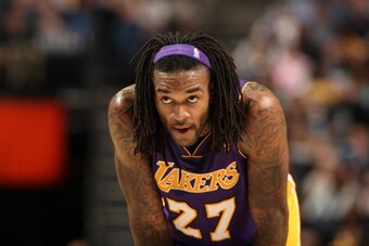 CHARLOTTE, NC - DECEMBER 14:  Jordan Hill #27 of the Los Angeles Lakers during the game against the Charlotte Bobcats at the Time Warner Cable Arena on December 14, 2013 in Charlotte, North Carolina.  NOTE TO USER: User expressly acknowledges and agrees t