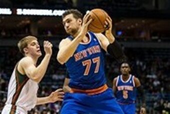 Dec 18, 2013; Milwaukee, WI, USA; New York Knicks forward Andrea Bargnani (77) during the game against the Milwaukee Bucks at BMO Harris Bradley Center.  New York won 107-101 in double overtime.  Mandatory Credit: Jeff Hanisch-USA TODAY Sports