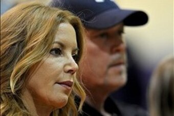 August 10, 2012; El Segundo, CA, USA;   Los Angeles Lakers Jeanie Buss and Jim Buss during a press conference held to introduce the three-time defensive player of the year who was aquired in a four-team trade from the Orlando Magic, Los Angeles Lakers cen