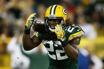 GREEN BAY, WI - SEPTEMBER 13:  Strong safety Jerron McMillian #22 of the Green Bay Packers reacts after breaking up a pass intended for tight end Kellen Davis #87 of the Chicago Bears in the third quarter at Lambeau Field on September 13, 2012 in Green Ba