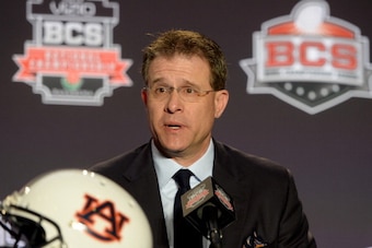 NEWPORT BEACH, CA - JANUARY 05:  Auburn Tigers Head Coach Gus Malzahn speaks to media during a Vizio BCS National Championship press conference at the Newport Beach Marriot Hotel and Spa on January 5, 2014 in Newport Beach, California.  (Photo by Harry Ho