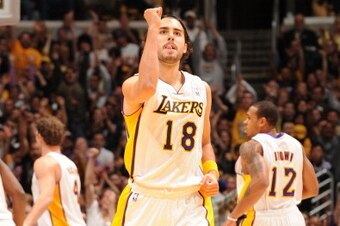 LOS ANGELES, CA - NOVEMBER 14:  Sasha Vujacic #18 of the Los Angeles Lakers pumps his fist after making a basket against the Phoenix Suns at Staples Center on November 14, 2010 in Los Angeles, California. NOTE TO USER: User expressly acknowledges and agre