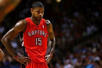 MIAMI, FL - JANUARY 05: Amir Johnson #15 of the Toronto Raptors looks on during a game against the Miami Heat at AmericanAirlines Arena on January 5, 2014 in Miami, Florida. NOTE TO USER: User expressly acknowledges and agrees that, by downloading and/or 