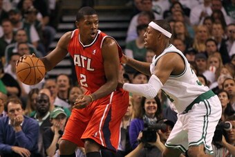 BOSTON, MA - MAY 04:  Joe Johnson #2 of the Atlanta Hawks works his way to the basket against Paul Pierce #34 of the Boston Celtics in Game Three of the Eastern Conference Quarterfinals during the 2012 NBA Playoffs on May 4, 2012 at TD Garden in Boston, M