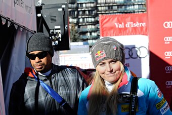 VAL D'ISERE, FRANCE - DECEMBER 21: (FRANCE OUT) Tiger Woods and Lindsey Vonn of USA during the Audi FIS Alpine Ski World Cup Women's Downhill on December 21, 2013 in Val d'Isere, France. (Photo by Michel Cottin/Agence Zoom/Getty Images)