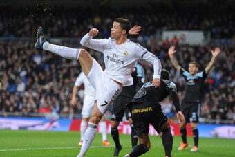 MADRID, SPAIN - JANUARY 06:  Cristiano Ronaldo of Real Madrid CF in action during the La Liga match between Real Madrid CF and RC Celta de Vigo at the Santiago Bernabeu stadium on January 6, 2014 in Madrid, Spain.  (Photo by Denis Doyle/Getty Images)