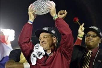 Jan 6, 2014; Pasadena, CA, USA; Florida State Seminoles head coach Jimbo Fisher celebrates with the Coaches Trophy after winning the 2014 BCS National Championship game against Auburn Tigers 34-31 at the Rose Bowl.  Mandatory Credit: Richard Mackson-USA T