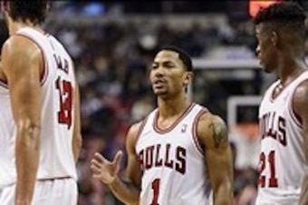 Nov 2, 2013; Philadelphia, PA, USA; Chicago Bulls guard Derrick Rose (1) talks with forward Luol Deng (9) center Joakim Noah (13) and guard Jimmy Butler (21) during the fourth quarter against the Philadelphia 76ers at Wells Fargo Center. The Sixers defeat