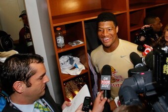 PASADENA, CA - JANUARY 06:  Quarterback Jameis Winston #5 of the Florida State Seminoles celebrates in the locker room after defeating the Auburn Tigers 34-31 in the 2014 Vizio BCS National Championship Game at the Rose Bowl on January 6, 2014 in Pasadena